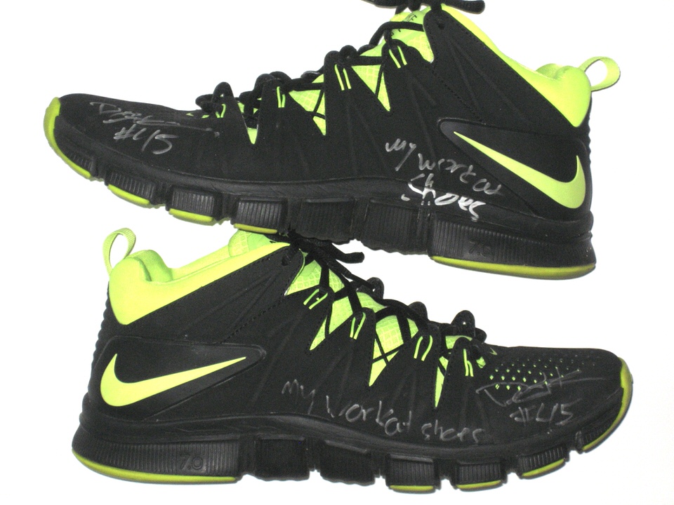 black and neon green nike shoes